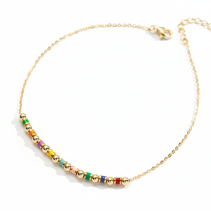 Colorful round beads close-up on silver chain