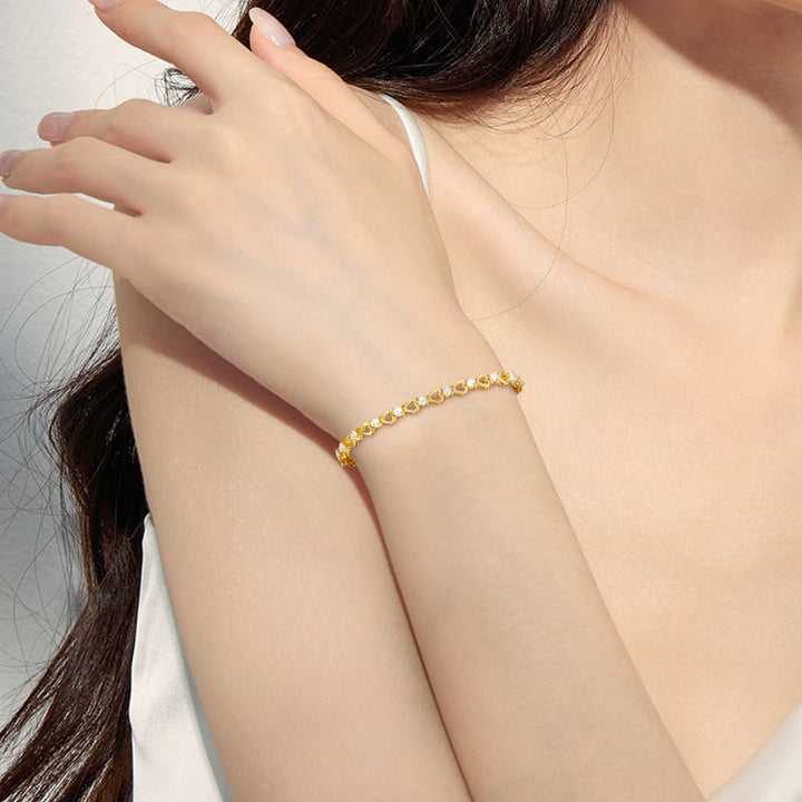 Copper zircon tennis bracelet, gold and white gold