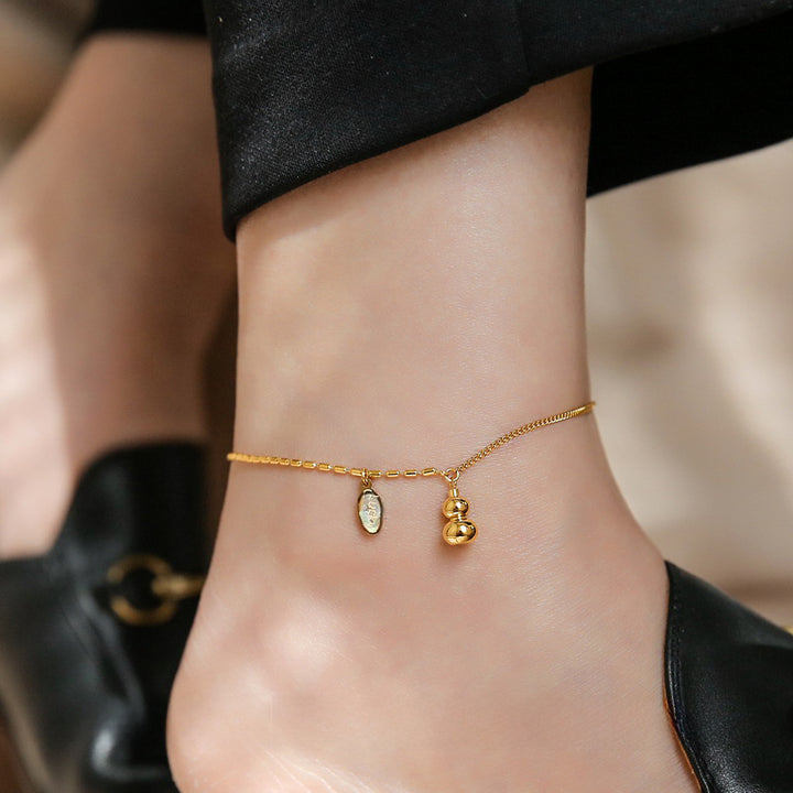Titanium steel charm anklet on red cord